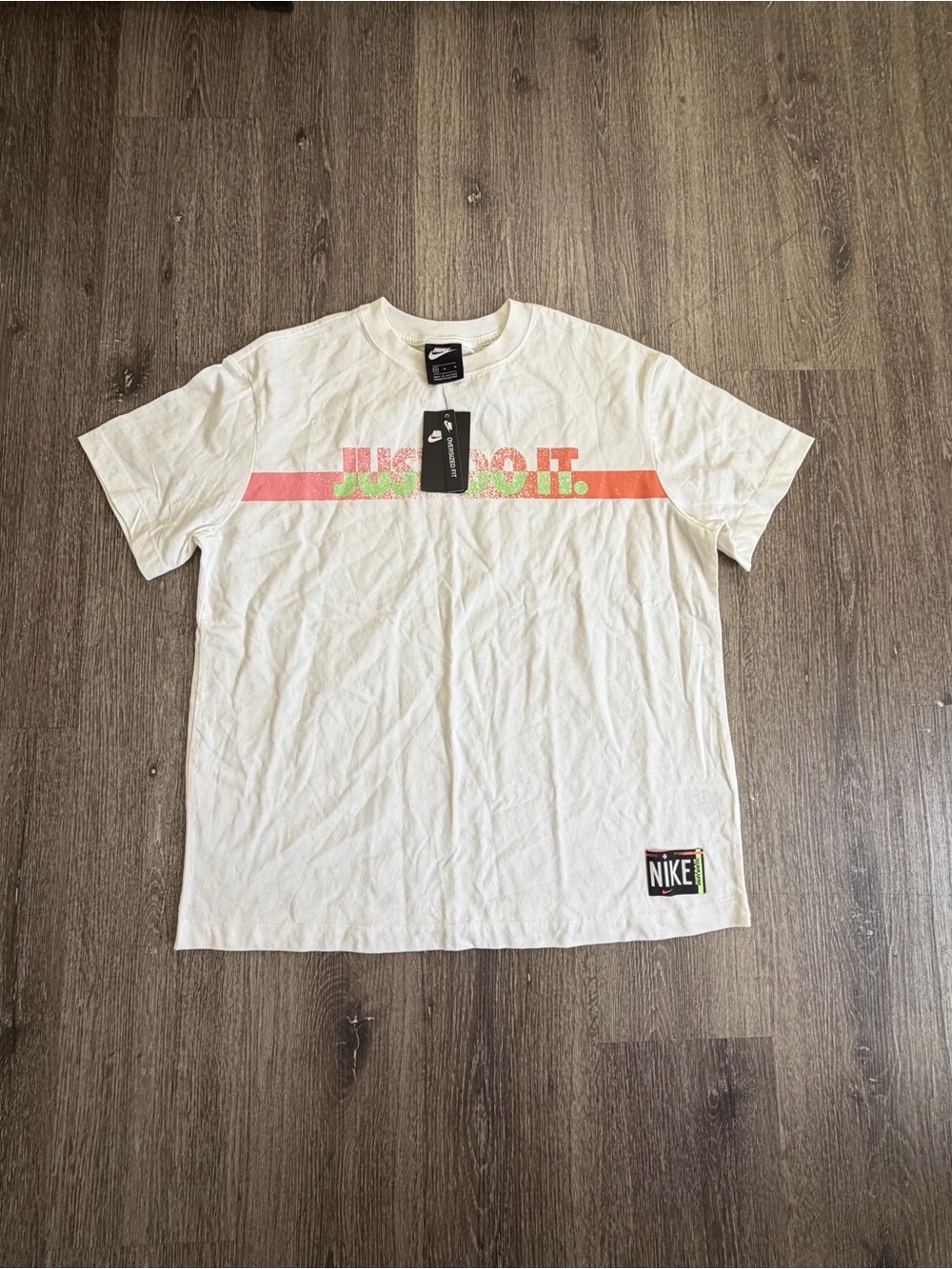 Nike White Tee with Pink and Green 'Just Do It' Stripe